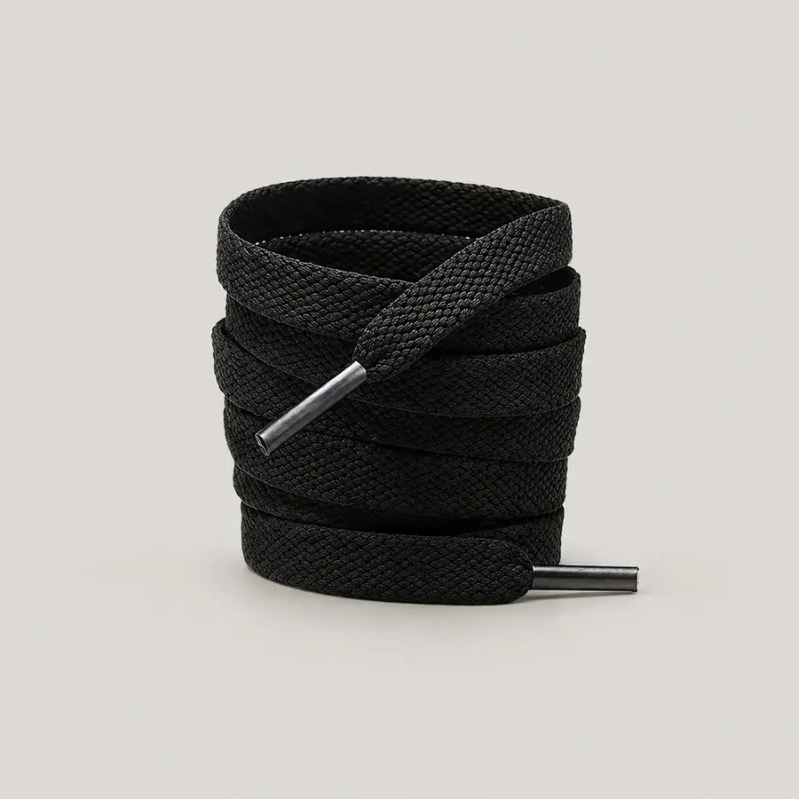 Plain black flat shoelace with silver metal aglets